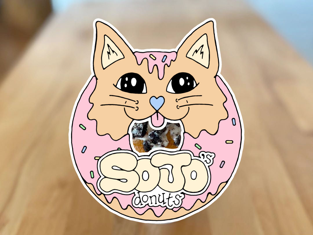 SoJo's Donut logo with donut in the background on a table